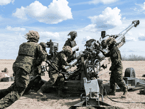 Canadian soldiers fire an M777 howitzer during a training exercise in Wainright, Alberta, on April 10, 2019. Canada has shipped some of the heavy artillery weapons to Ukraine.