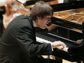 Russian pianist Daniil Trifonov performs during a gala concert at the XIV International Tchaikovsky Competition in St. Petersburg, Russia, on July 2, 2011.