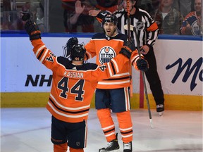 Edmonton Oilers Evan Bouchard (75) celebrates his goal with Zack Kassian (44) against the Colorado Avalanche during NHL action at Rogers Place in Edmonton, April 22, 2022. Ed Kaiser/Postmedia