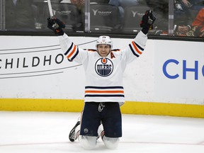 Edmonton Oilers center Leon Draisaitl reacts after scoring his 50th goal of the season against the Anaheim Ducks in Anaheim, Calif., on Sunday, April 3, 2022. The Oilers won 6-1.