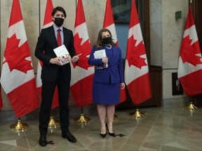 Prime Minister Justin Trudeau and Finance Minister Chrystia Freeland have copies of the federal budget.