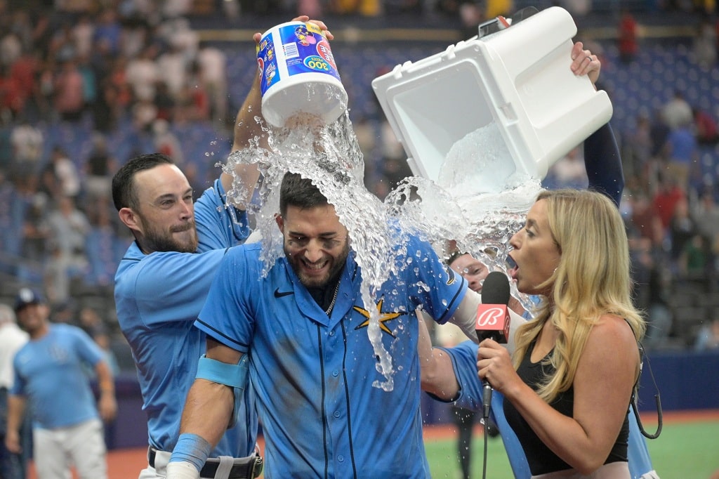 Rays center fielder Kevin Kiermaier is sprayed by teammates after hitting a walk-off home run against the Red Sox on Saturday.