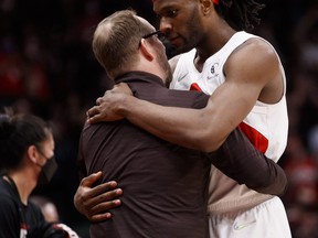 Precious Achiuwa #5 of the Toronto Raptors hugs head coach Nick Nurse in the second half of Game Four of the Eastern Conference First Round against the Philadelphia 76ers at Scotiabank Arena on April 23, 2022.