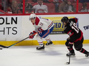 Montreal Canadiens winger Brendan Gallagher (11) is pursued by Ottawa Senators forward Tim Stutzle on Saturday at the Canadian Tire Center.