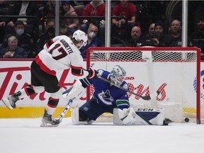 Ottawa Senators' Adam Gaudette (17) scores the winning goal against Vancouver Canucks goalie Thatcher Demko during a shootout on Tuesday night.