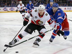 Ottawa Senators left wing Parker Kelly (45) skates with the puck past New York Rangers defenseman Justin Braun (61) during the first period at Madison Square Garden.