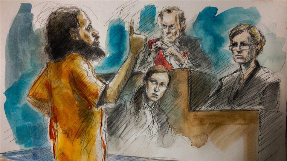 A court drawing of Chiheb Esseghaier in front of the judges.