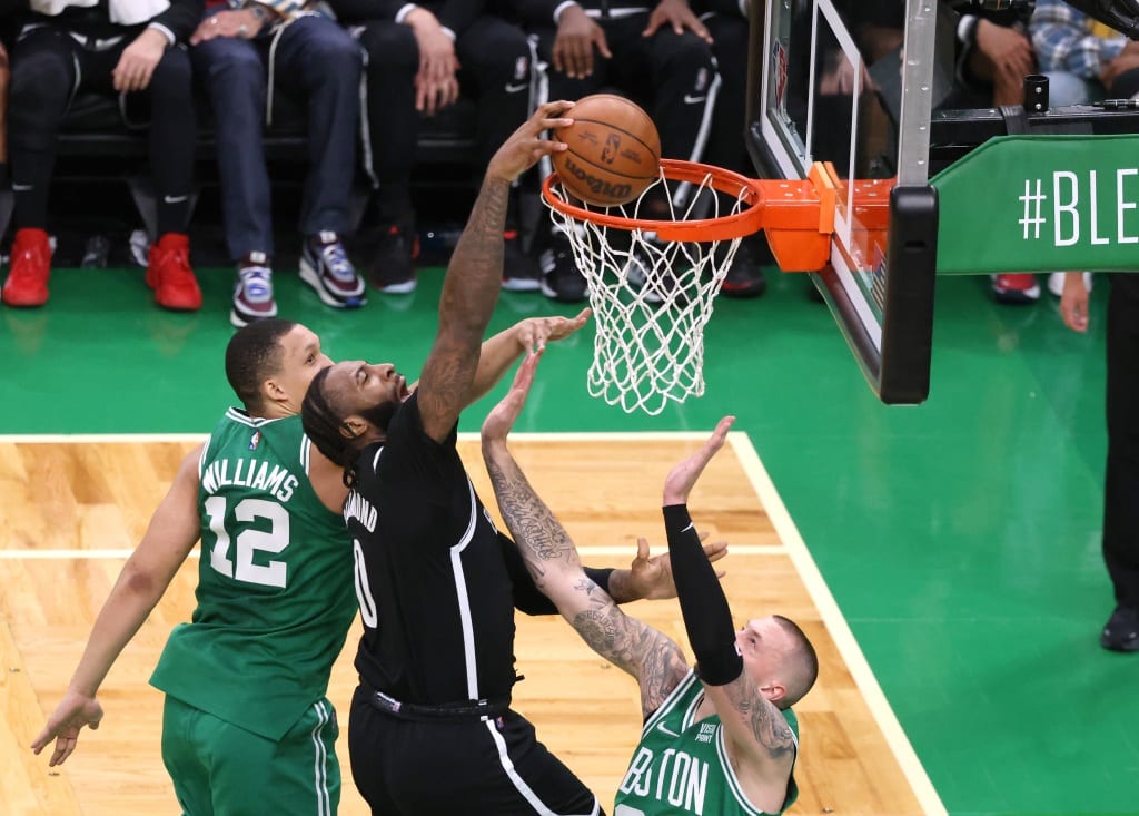 Andre Drummond dunks during the Nets' Game 2 loss to the Celtics.