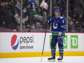 Canucks forward JT Miller cuts a lonely figure, watching the Ottawa Senators celebrate their 4-3 shootout win on April 19, 2022 at Rogers Arena.
