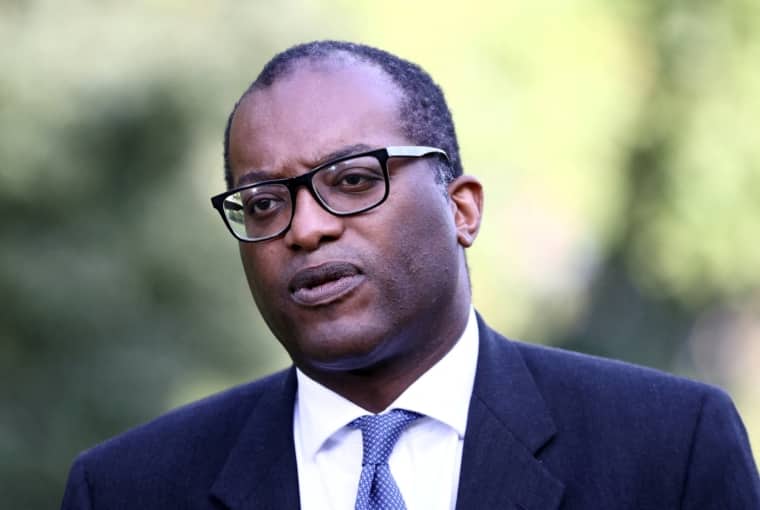 FILE PHOTO: Britain's Secretary of State for Business, Energy and Industrial Strategy Kwasi Kwarteng speaks to the media in Westminster, London, Britain September 21, 2021. REUTERS/Hannah McKay/File Photo