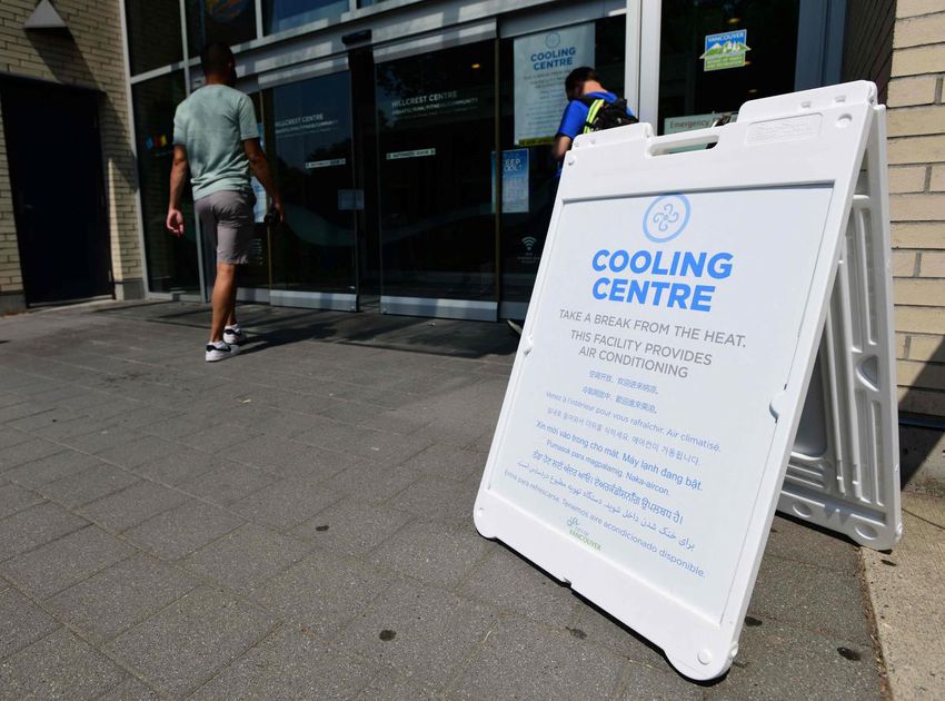 A person enters the Hillcrest Community Center where they can cool off during the extreme hot weather in Vancouver, BC on June 30, 2021. A new report recommends Canadians, especially in 15 identified communities, make a plan for extreme heat including identifying a cooling place to go if home is not adequately cool.