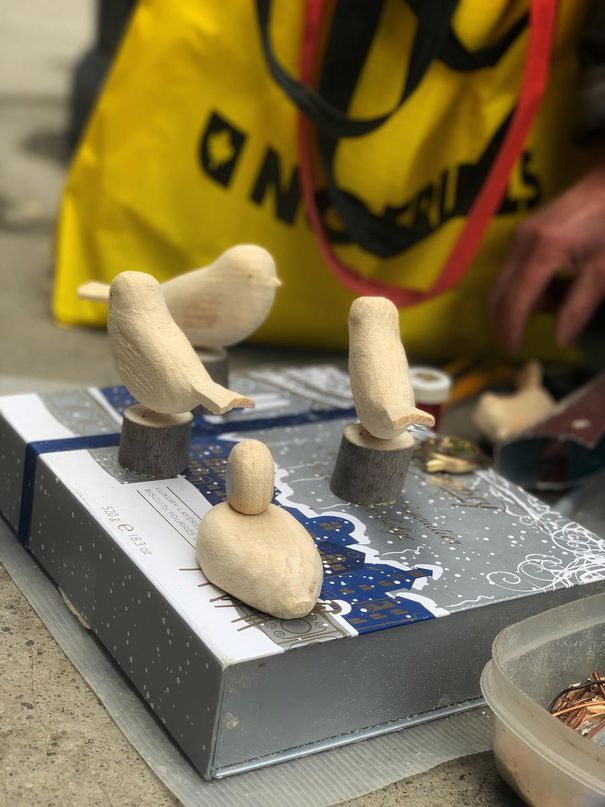 Ross Ward, also known as Birdman, is a fixture downtown, where he spends his days carving and selling beautiful, tiny wooden birds to passersby.