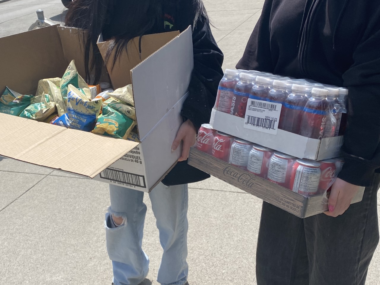 University of Toronto students buy food and drinks in bulk to spend their leftover meal plan dollars.