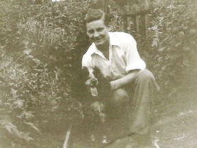 Jim Hume, at age 15, with his dog Boy Blue.