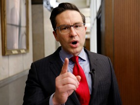 Conservative party leadership candidate Pierre Poilievre speaks to journalists on Parliament Hill in Ottawa, Feb.16, 2022.