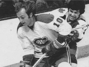 The Montreal Canadiens' Guy Lafleur skates against the Toronto Maple Leafs' Ian Turnbull in 1977.
