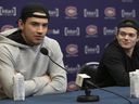 Nick Suzuki (left) and Cole Caufield answer questions during Canadiens' post-mortem news conference Saturday at the Bell Sports Complex in Brossard.