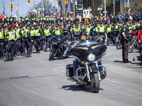 The 'Rolling Thunder' Ottawa motorcycle rally made their way through downtown Ottawa on a controlled route along Elgin Street Saturday, April 30, 2022.