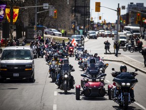The 'Rolling Thunder' Ottawa motorcycle rally made their way through downtown Ottawa on a controlled route along Elgin Street Saturday, April 30, 2022.