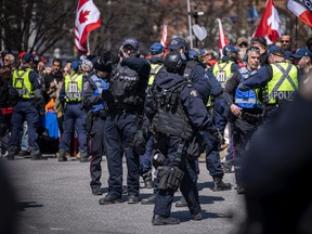 Police from Ottawa Police Service and RCMP worked together to control the crowd Saturday morning.
