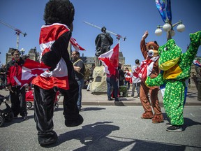 The 'Rolling Thunder' Ottawa rally were in Ottawa, Saturday, April 30, 2022. The event may not have had bouncy castles but there was still some fun for children had with characters dancing around outside the gates of Parliament Hill.