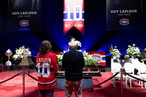 Canadiens fans pay tribute during the visitation for Guy Lafleur at the Bell Center on Sunday, May 1, 2022.