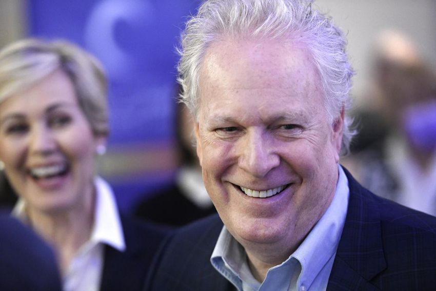 Jean Charest, seen with wife Michèle Dionne, drew on his record of leading Quebec as a fiscal conservative, steering clear of talk about COVID-19 restrictions.