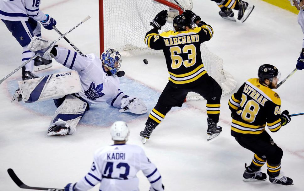 Toronto Maple Leafs goaltender Frederik Andersen looks back as the puck bounces to the back of the net on a goal by Boston Bruins right wing David Pastrnak (88) during the third period of Game 7 of an NHL hockey first-round playoff series in Boston, Wednesday, April 25, 2018.