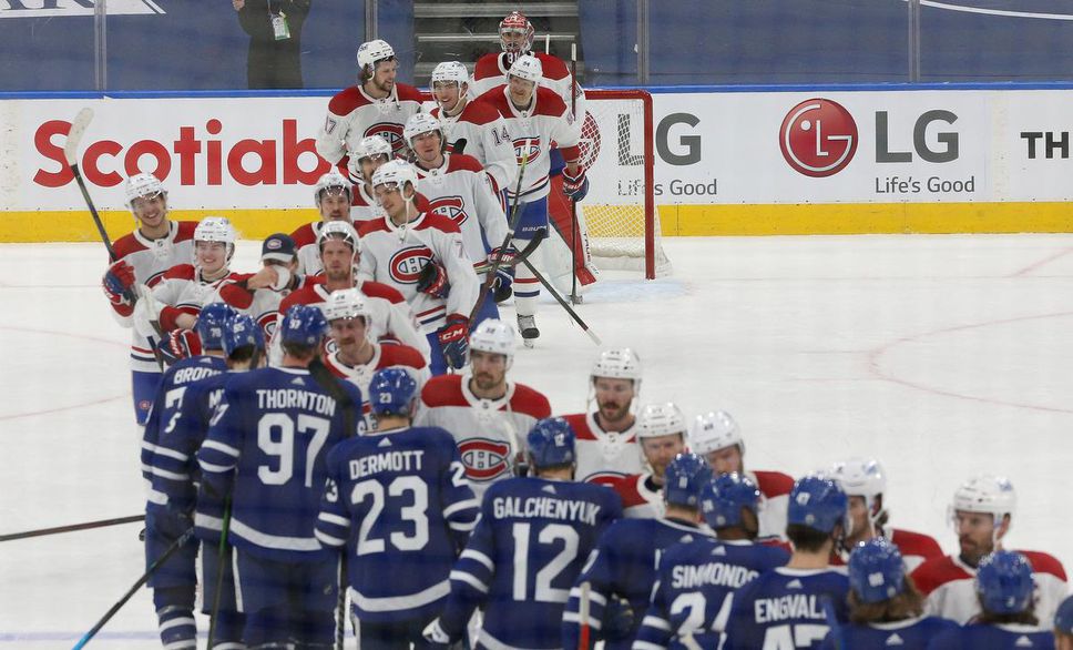 Montreal Canadiens shake hands with the Toronto Maple Leafs after the conclusion of their 2021 first round series.
