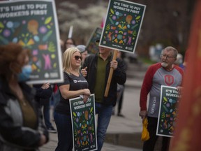 Local workers and civil society activists hold a rally titled 'Fight for a Better Ontario' at Charles Clark Square, one of twenty-one rallies held in Ontario, on Sunday, May 1, 2022.
