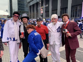 Toronto Mayor John Tory and his pals got dressed up for Game 1. JOE WARMINGTON/TORONTO SUN