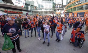 People take part in the celebrations as the Edmonton Oilers have clinched home ice advantage in the first round of the 2022 Stanley Cup Playoffs.  Edmonton's ICE District is the center of the activities including the Oilers tailgate event on Monday, May 2, 2022 in Edmonton.