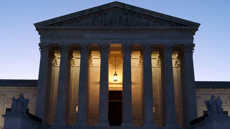 The U.S. Supreme Court is seen at dawn on Capitol Hill in Washington, Monday, March 21, 2022. The Senate Judiciary Committee begins historic confirmation hearings Monday for Justice Ketanji Brown Jackson, who would be the first Black woman on the Supreme Court.  (AP Photo/Jose Luis Magana)