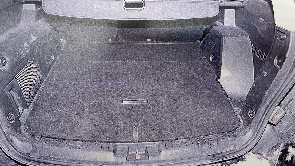 The open trunk of the vehicle.