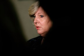 Associate Minister of Status of Women Whitney Issik speaks to the media inside the Alberta Legislature in Edmonton, Tuesday May 3, 2022.