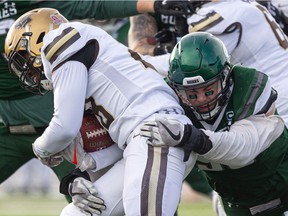 University of Saskatchewan Huskies' Nathan Cherry makes a tackle during the 84th Hardy Cup Championship game in November, 2021.