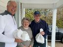 LaSalle Mayor Marc Bondy, left, makes a Meals on Wheels delivery to Liz Morneau with volunteer Jim McLaughlin Wednesday, March 23, 2022.