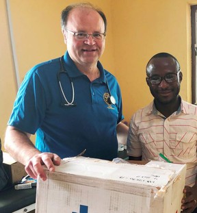 Windsor's Dr. Chris Spirou, this year's recipient of a Herb Gray Harmony Award, is shown working at a rural health clinic in Beruka, Ghana, in 2019. (Photo courtesy of Kim Spirou)