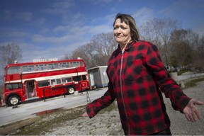 Kathleen Yetman, owner of Birdies Perch, is pictured on Wednesday outside the distinctive red double decker bus that had been converted into a restaurant on Point Pelee Drive.  It's now being sold after the owner and the municipality couldn't reach a site plan agreement.