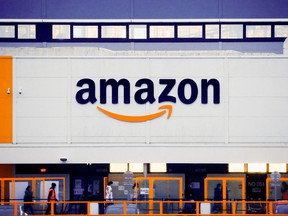 The logo of Amazon is seen at the company’s logistics centre in Bretigny-sur-Orge, near Paris, France, Dec. 7, 2021.