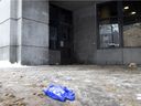 Only a pair of paramedics gloves remain near the St-Denis St. entrance to the Berri-UQAM métro station, where an unhoused woman died outside in the cold on Jan. 20, 2022.