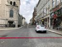 Police cars close off a street in Old Quebec after the sword attacks of Oct. 31, 2020.
