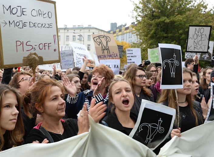 Polish women take part in a nationwide strike and demonstration to protest against a legislative proposal for a total ban of abortion on October 3, 2016 in Warsaw.

Thousands of women dressed in black protested across Poland in the &quot;Women strike&quot; campaign against a proposed near-total abortion ban in the devoutly Catholic country where legislation is already among the most restrictive in Europe.