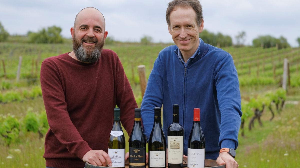 Josep Sabarich, technical director of Familia Torres, and Miquel Torres Maczassek, fifth generation of the winery, with the five new vintages of the anthology wine collection.