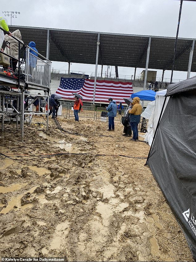 Inches of mud lined the entire fairgrounds for Trump's rally in the southeastern Pittsburgh suburb of Greensburg, Pennsylvania on Friday as rain persisted throughout the night. The bleachers were off-limits to rally goers – instead seen covered with massive American flags