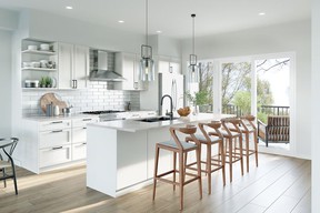 The kitchen offers seating for four around a quartz countertop island and appliance package from GE.