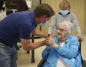 Gerda Cole, 98, meets her daughter Sonya Grist, 80, and her grandson, Stephen Grist, for the first time on Saturday, May 7, 2022.