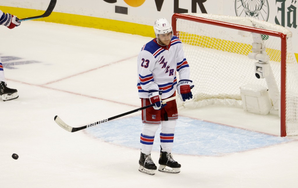 Adam Fox reacts dejected after the Penguins scored a goal into the open net during the third period of the Rangers' 7-4 loss to the Penguins.