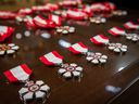 Rows of medals ready to be presented to Officers and Members of the Order of Canada during a ceremony at Rideau Hall.  ORG XMIT: Sergeant Mathieu St-Amour,