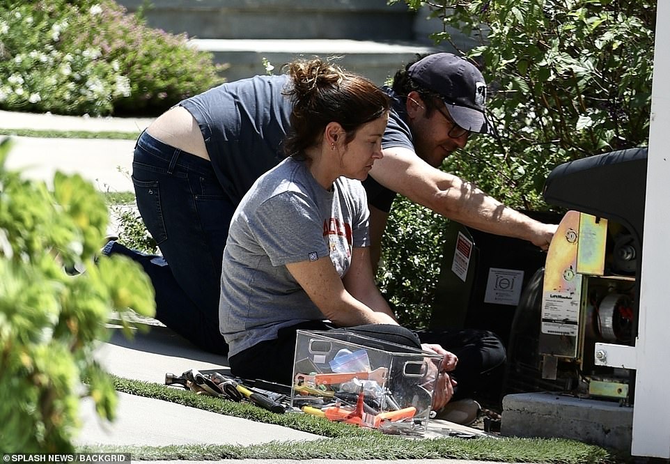On Saturday, Savage was seen working in the garden with his wife Jennifer Lynn Stone.